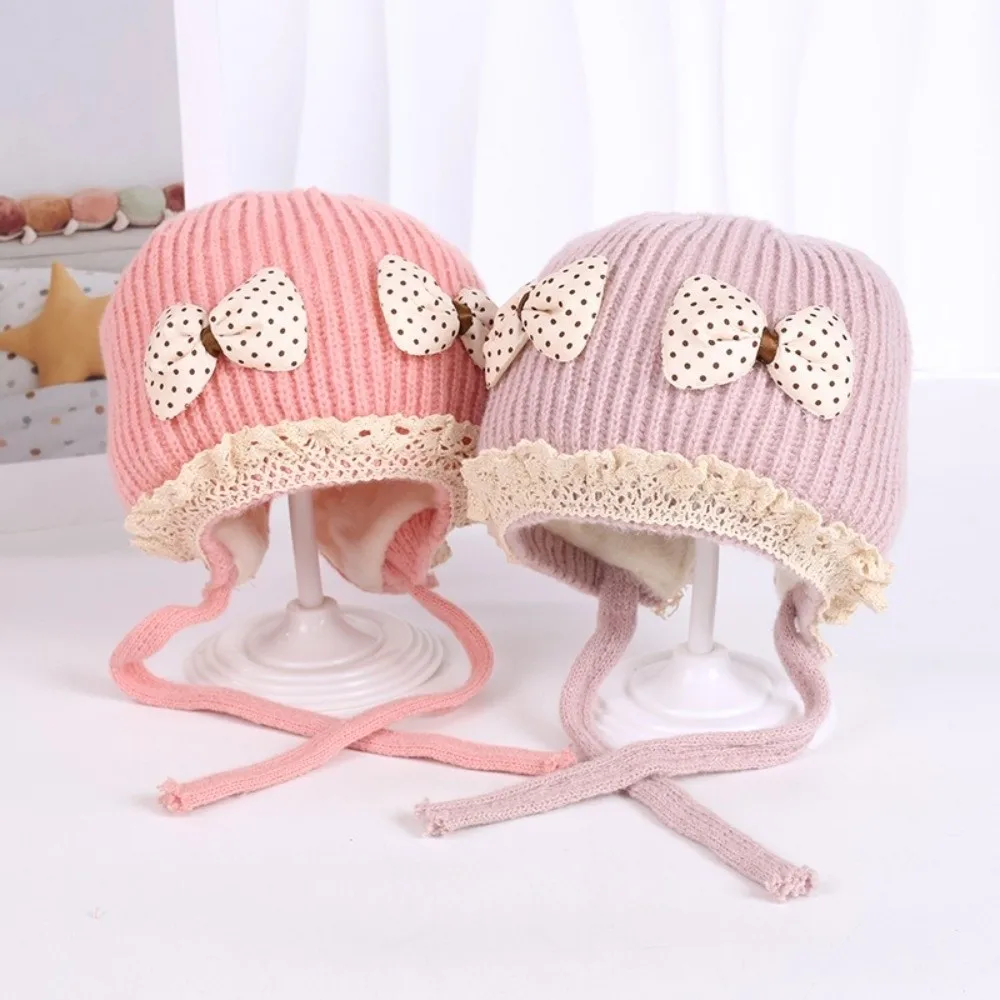 قبعة صوفية دافئة مقاومة للبرد والرياح لحماية الأذن قبعة Pompom محبوكة قبعة Lei Feng 3-36M