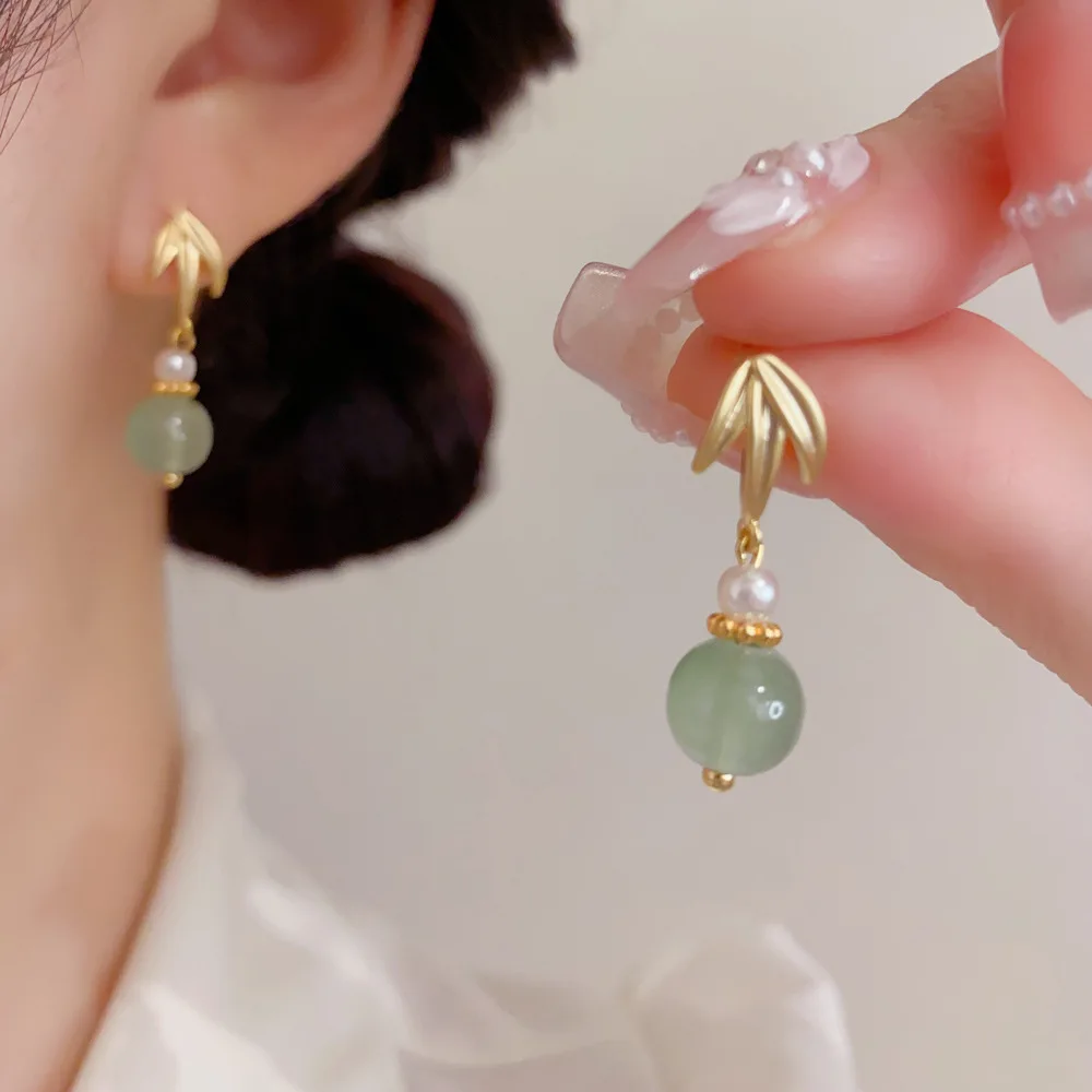 Bamboo Leaf Motif Drop Earrings With Translucent Green Bead And Dangling Spherical Charm For Oriental Aesthetic Style Vibe