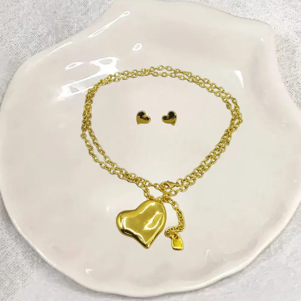 

2026 Spain Beautiful socialite style gold silver heart-shaped earrings long necklace jewelry two-piece set holiday gift