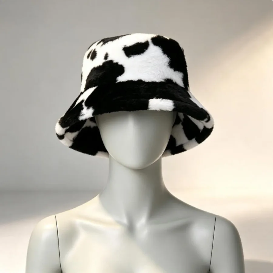 One piece of women's cow-print plush bucket hat, stylish and versatile for autumn and winter.