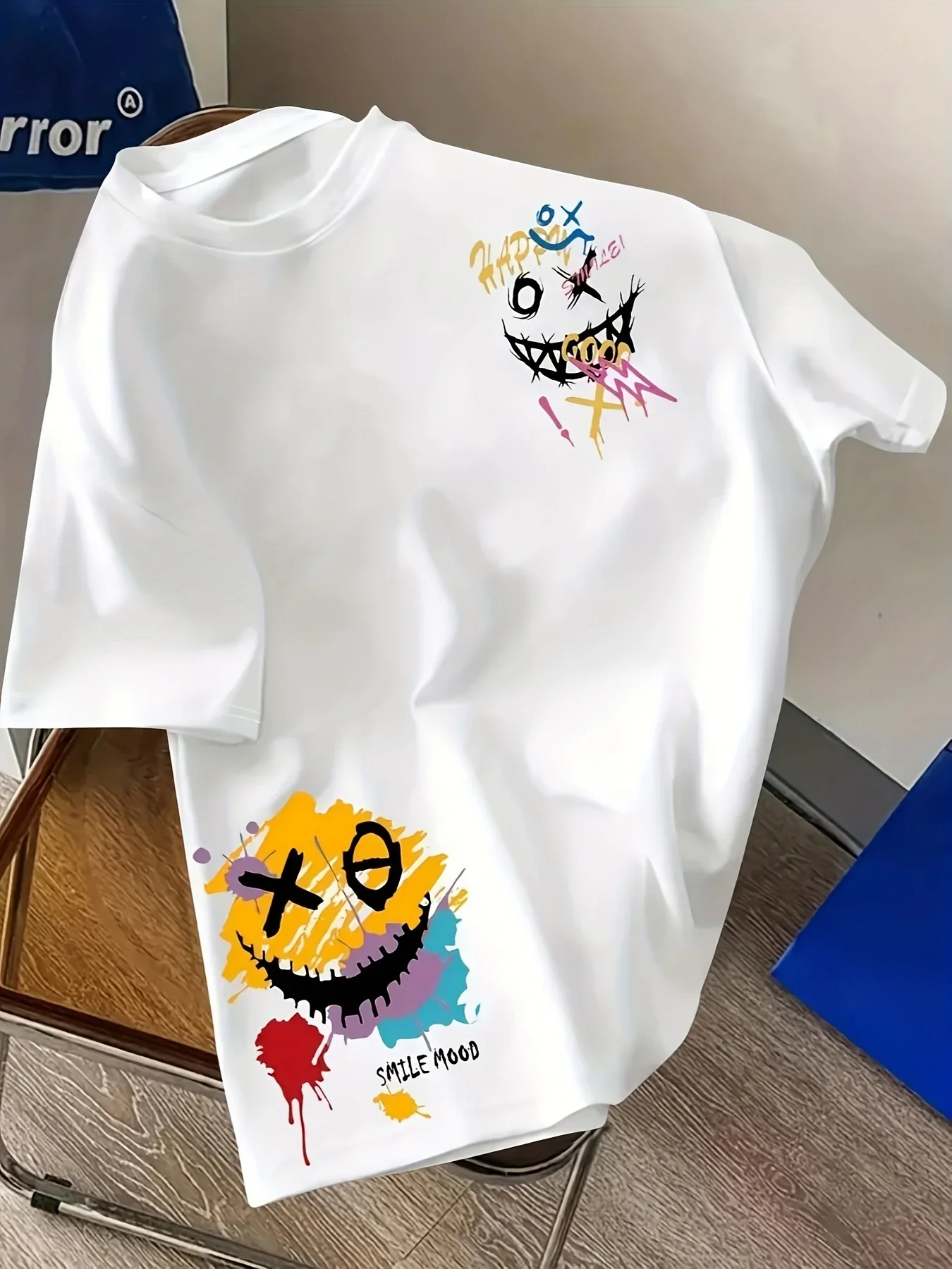 T-shirt 100% coton pur, adapté aux hommes et aux femmes, avec un graffiti amusant et tendance, imprimé visage souriant, adapté à un usage quotidien