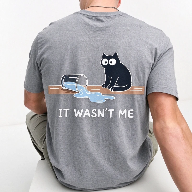 Humorous It Wasn't Me Black Cat Back Graphic T‑Shirt for Men Spilled Cup Kitty Print Short Sleeve Tee Casual Cotton Top
