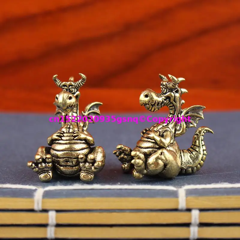 2 uds película Anime personajes de cuento de hadas juego figura de dibujos animados pequeño adorno tallado en cobre dinosaurio embarazada pterosaurio dragón