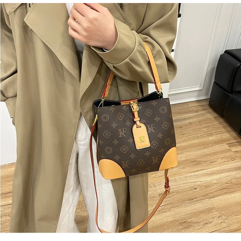 Toplaagse dameshandtassen, gemaakt van echthoekig bedrukt leer, trendy Wales, duurzame, lichtgewicht, zachte stijl