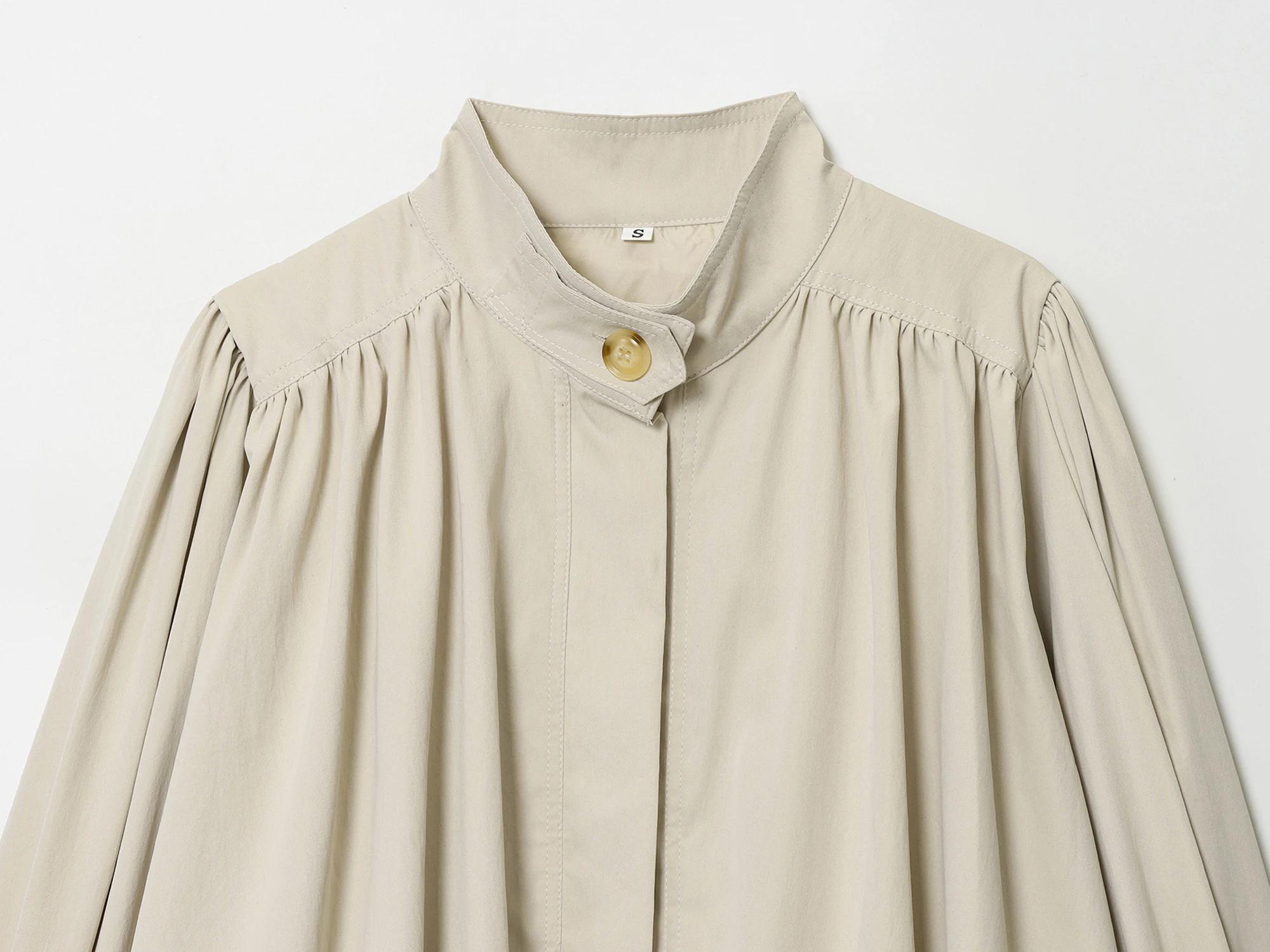 معطف بياقة مدورة مطوي لعام 2025 أنيق وعصري بنمط جديد مريح ملابس مكتبية معطف مغر كلاسيكي متعدد الاستخدامات غير رسمي