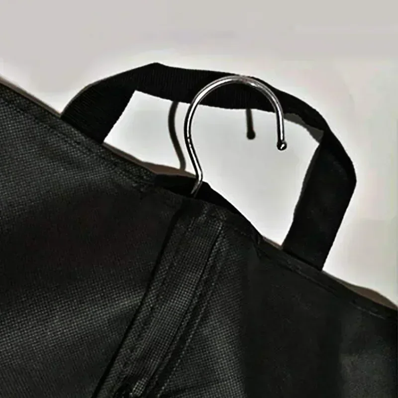 STN3 Bolsa para el polvo portátil para un fácil almacenamiento de ropa, negra de moda, popular entre hombres y mujeres.