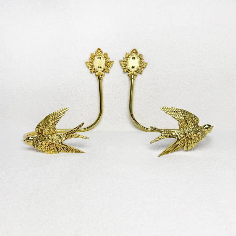 Retro light luxury creative brass swallow curtain hook wall-mounted bedroom living room decoration