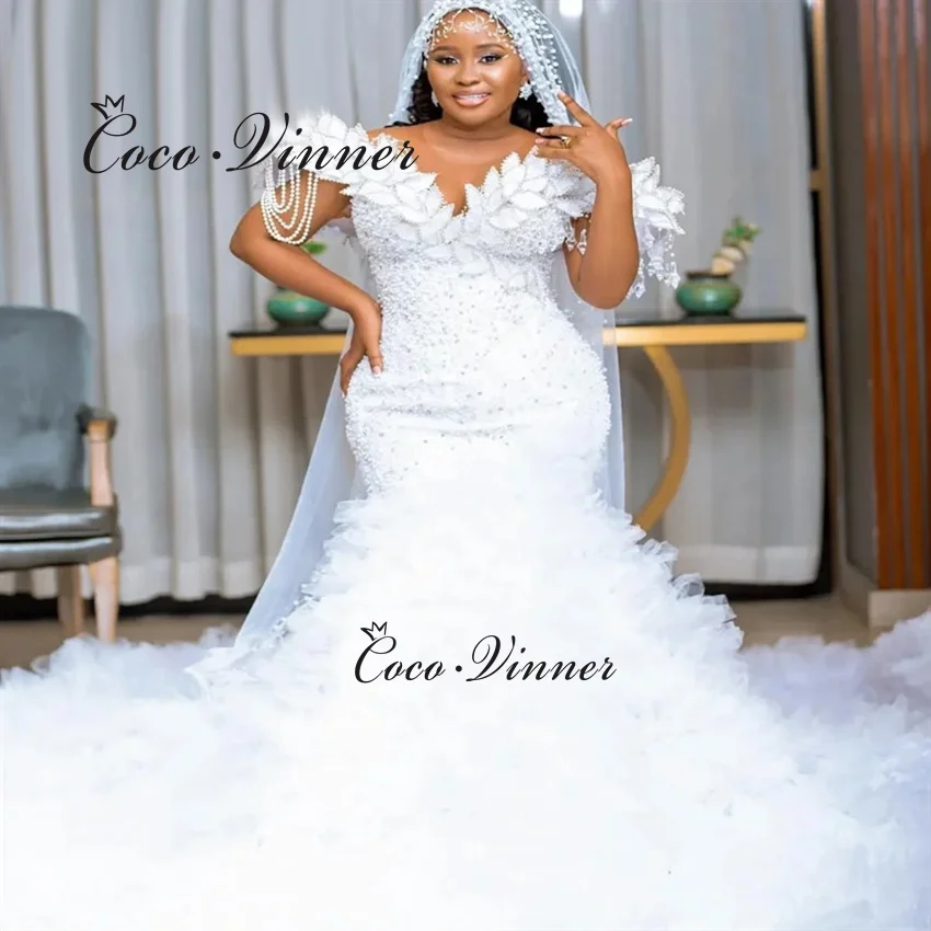 

Customized Fashion Design Tulle Ruffle Train Mermaid Wedding Dress 2026 Africa Style Heavy Beading Mermaid Bride Dresses W1472