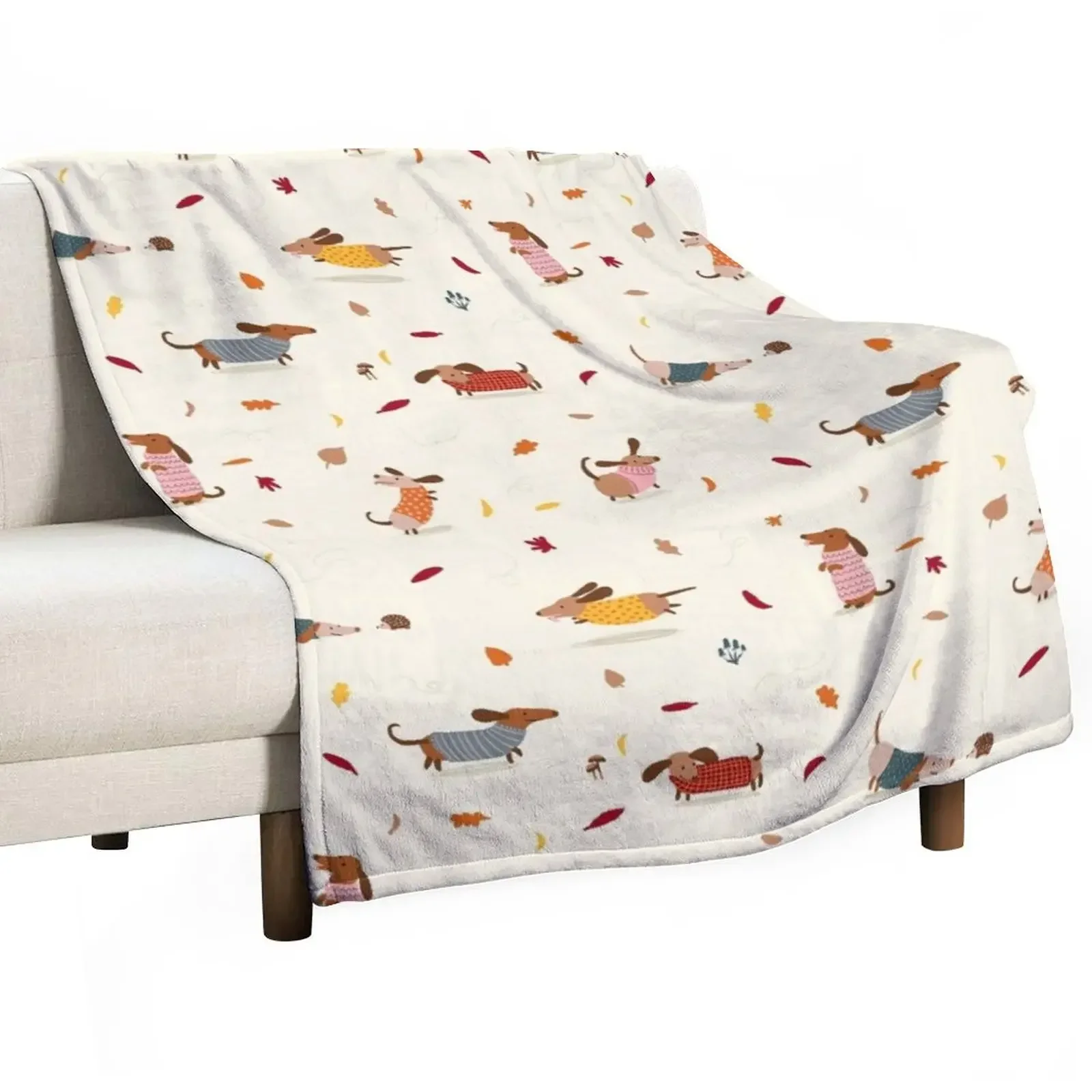 

Cute Dachshunds in Winter Sweaters with Autumn Leaves Throw Blanket wednesday Bed covers Blankets