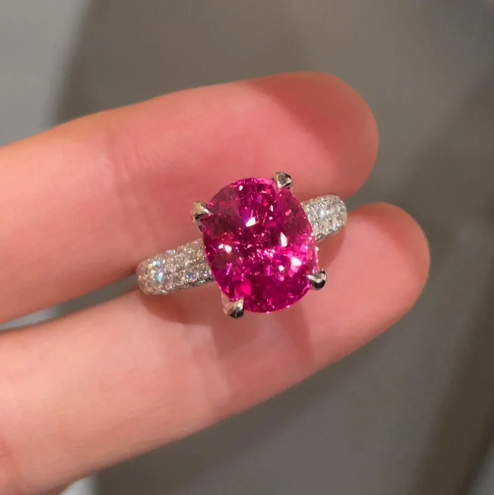 Exquisite 925 Sterling Silver Ruby Spangled Open Ring for Women. Fashionable Gemstone Jewelry with Bold Settings.