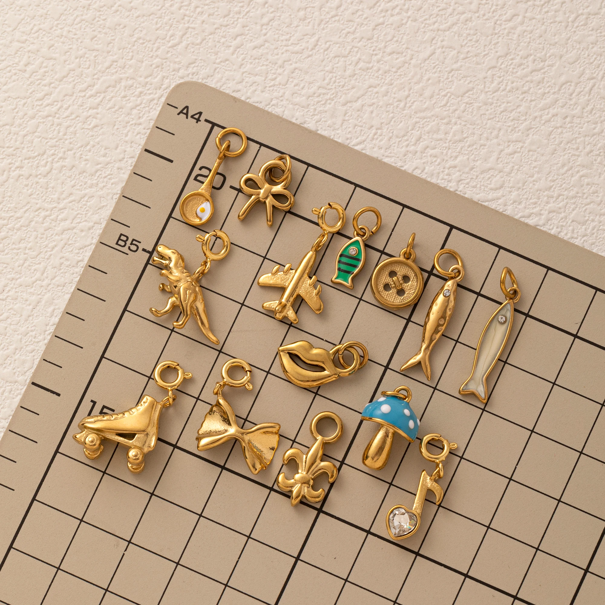 

Stainless steel fish mushroom airplane purse egg bow pendant DIY accessories jewelry pendant