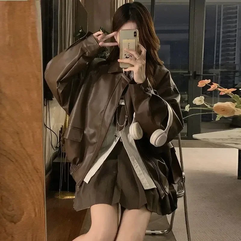 เสื้อแจ็คเก็ตหนัง เสื้อแจ็คเก็ตสั้น 2025 รุ่นใหม่สำหรับผู้หญิง ฤดูใบไม้ร่วงและฤดูหนาว สไตล์อเมริกัน เสื้อแจ็คเก็ตสั้น ฤดูใบไม้ผลิและฤดูใบไม้ร่วง