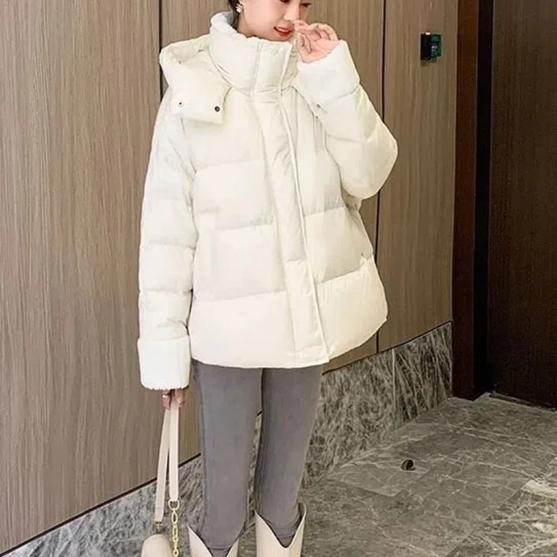 Winter New Solid Color Turn-down Collar Long Sleeve Fashion Hooded Parkas Women High Street Casual Zipper Button Patchwork Coat