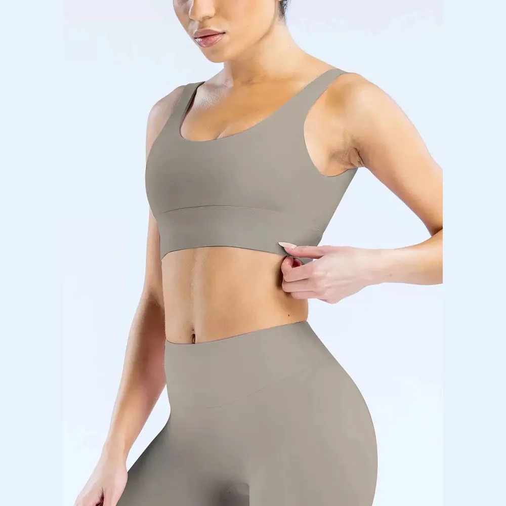 

‌Women's Textured Seams Yoga Sports Bra - 4-Way Stretch Quick-Dry & Breathable for Fitness Training