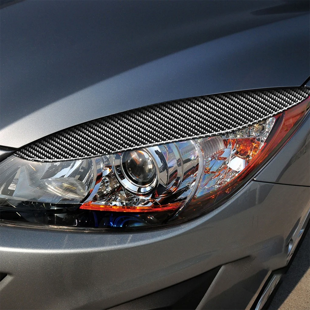 

2Pcs Car Stickers Trim Carbon Fiber Headlight Strip Eyebrows Parts