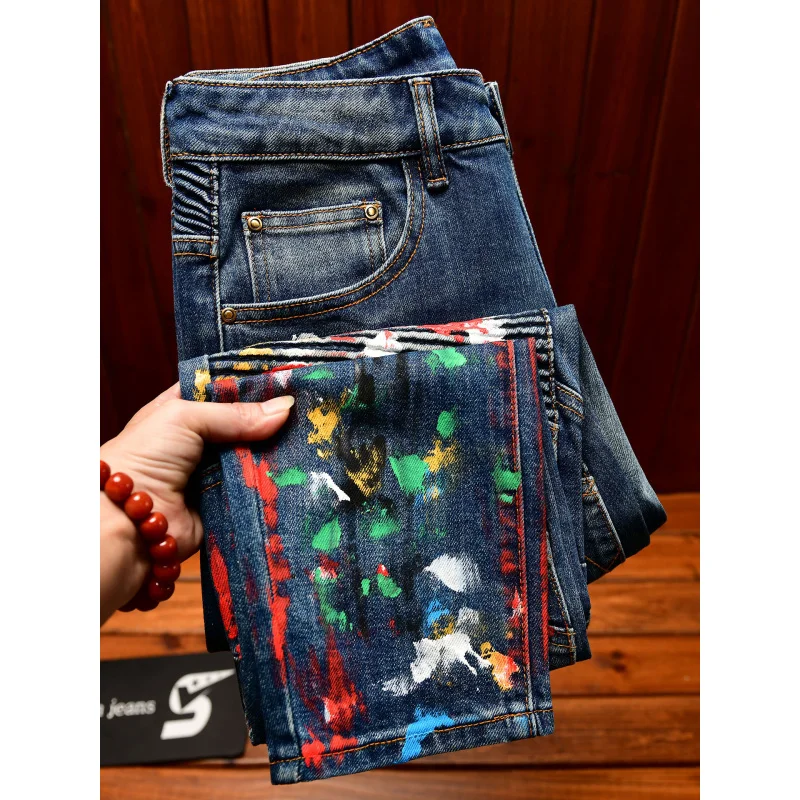 

Paint printed motorcycle jeans men's new autumn and winter small foot trend elastic retro men's pants