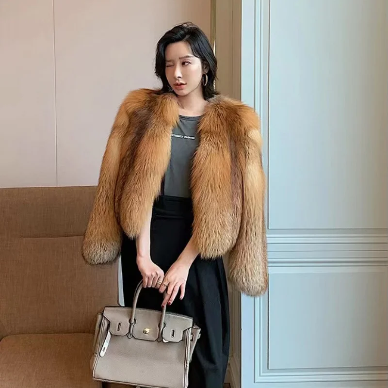 Модное женское пальто из лисьего меха