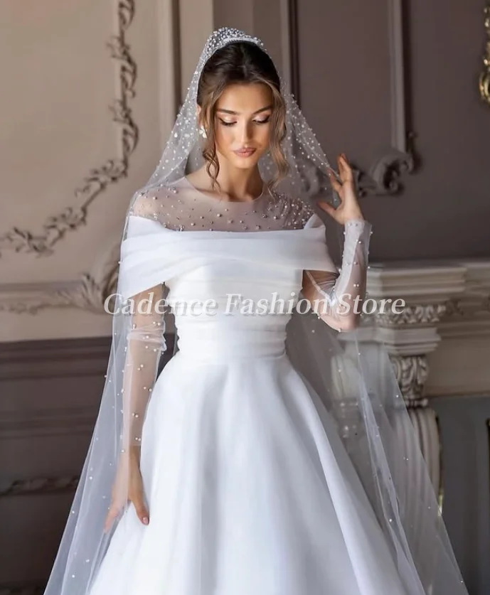 Gaun Pengantin Arab Putih Mewah yang Disesuaikan Gaun A-line Panjang Lantai Elegan Manik-manik Mengkilap Gaun Pengantin Dubai Panjang