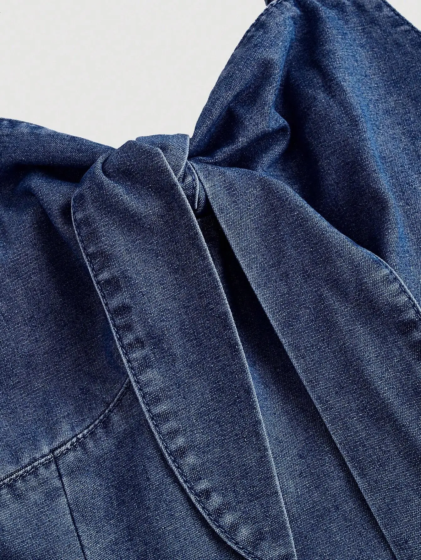 Y2K Style Denim Mini Dress Featuring Front Bow Knot, Ruffles, And Solid Color For Casual Or Party Wear