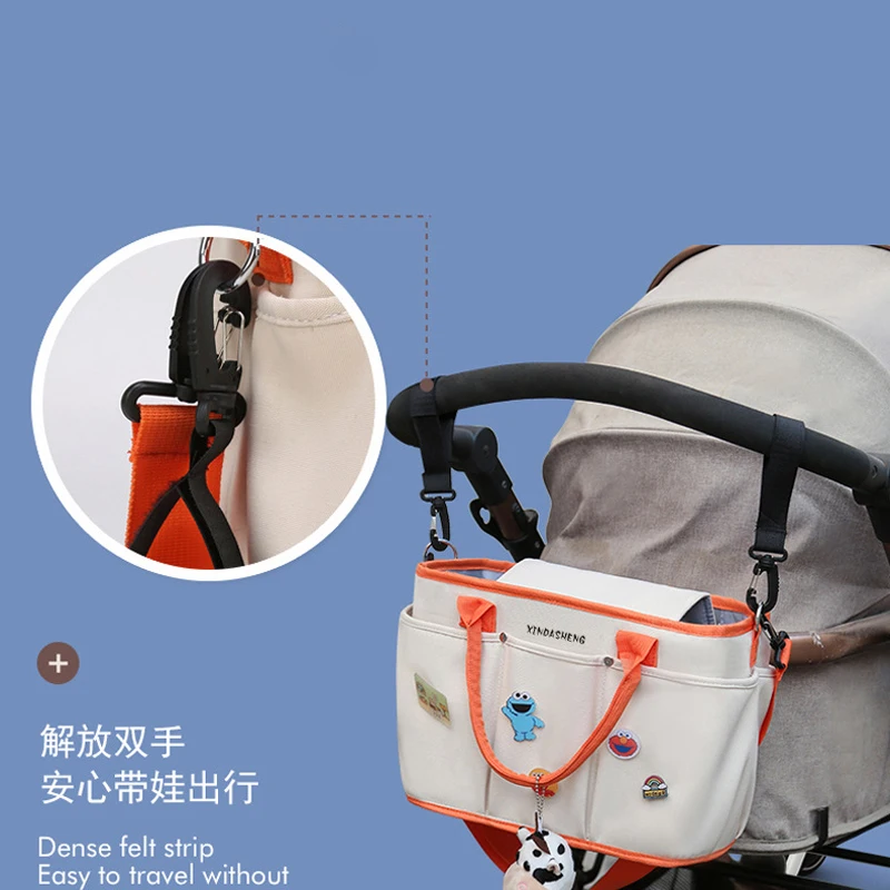 2024 New Handheld Mommy Bag Out Shoulder Crossbody Multifunctional Mother and Baby Bag Maternity Bag Baby Stroller Hanging Bag