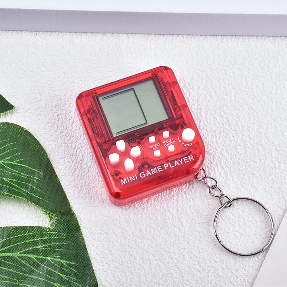 Mini Consola Retro Con Llavero, 26 Juegos Clásicos Integrados Y 99 Niveles De Dificultad. Ligera Y Portátil. Regalo Ideal Para Niños.