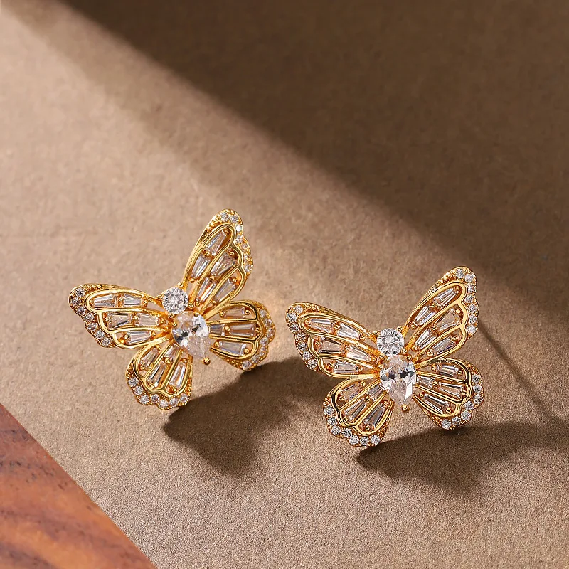 

Sweet and fashionable micro-paved zircon three-dimensional butterfly earrings niche high-end earrings vacation style earrings