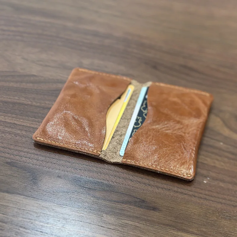Leather card bag, thin retro small card bag, vegetable tanned cowhide, simple bank card bag, folding portable wallet.