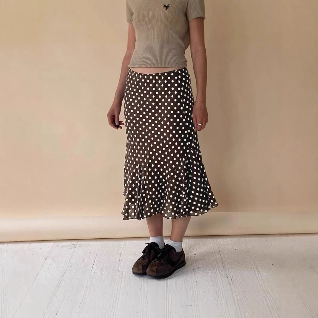 

New polka-dot printed low-waisted fishtail skirt European and American style slim and slim ruffled hip skirt short skirt female