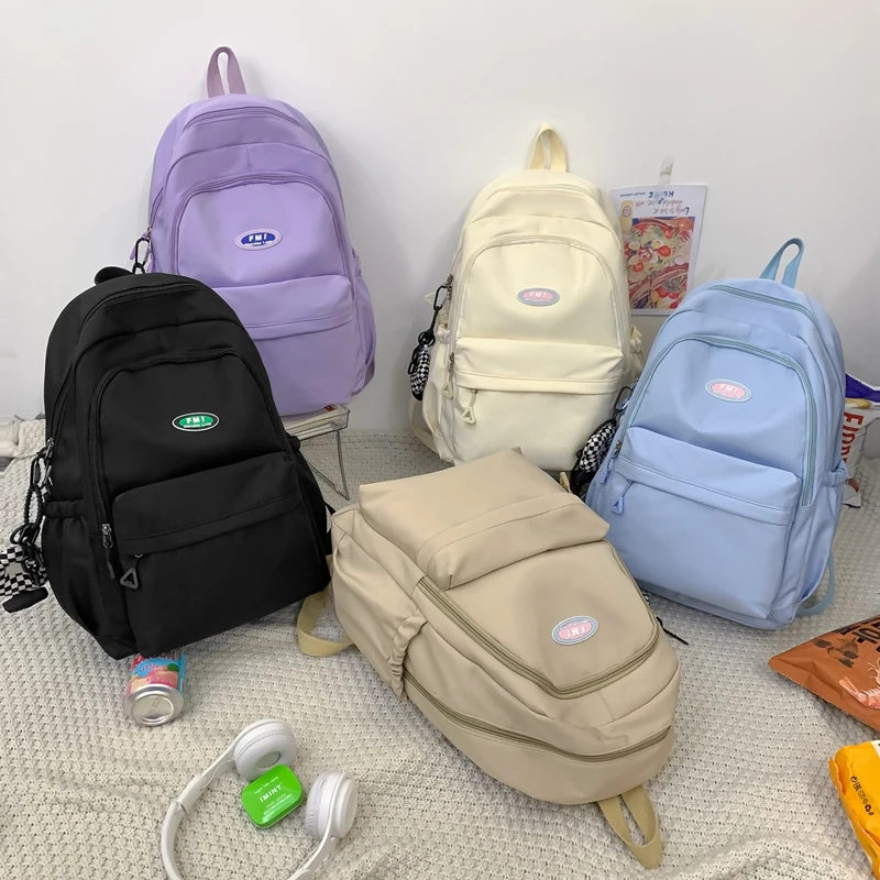 New Solid Color Waterproof Backpack Young Girls Korean Style Kawaii School Bag Shoulder Bag High School Students Nylon Backpacks