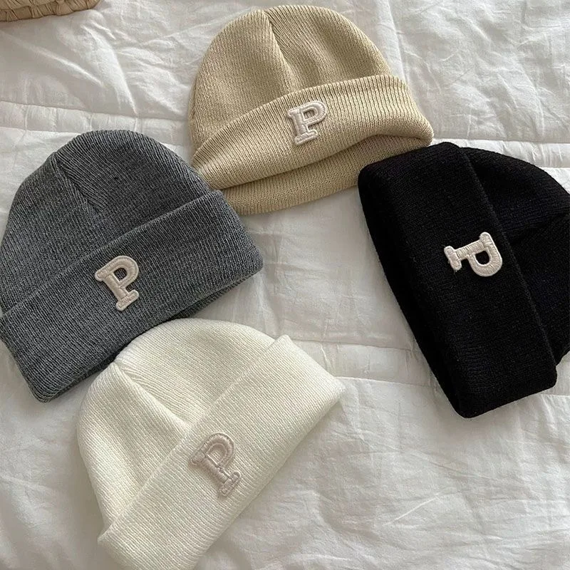 

ins Korean version of the simple letters P label baby knitted woolen pullover cap fall and winter small baby hat warm melon skin