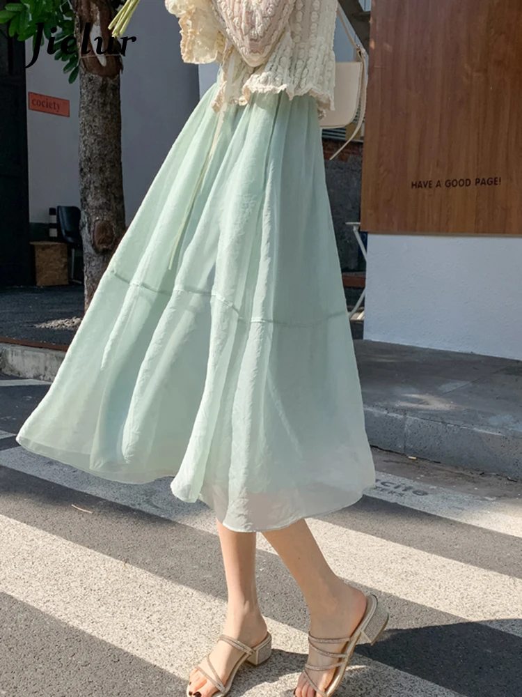 

Jielur Green Spring Summer Skirts Women Vintage High Waist Elastic Chic Midi A-line Skirt Female Preppy Style Black Skirts Lady