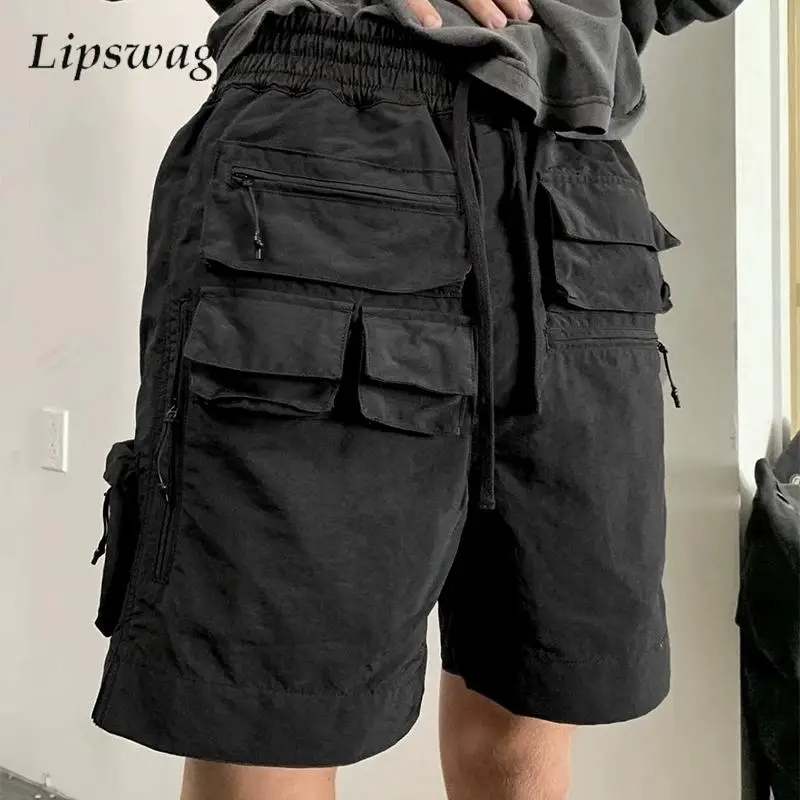 Trendy Mens Mutli Pockets Cargo Shorts Summer Vintage Drawstring Tie-up Loose Shorts Y2K Fashion Men Solid Color Straight Shorts