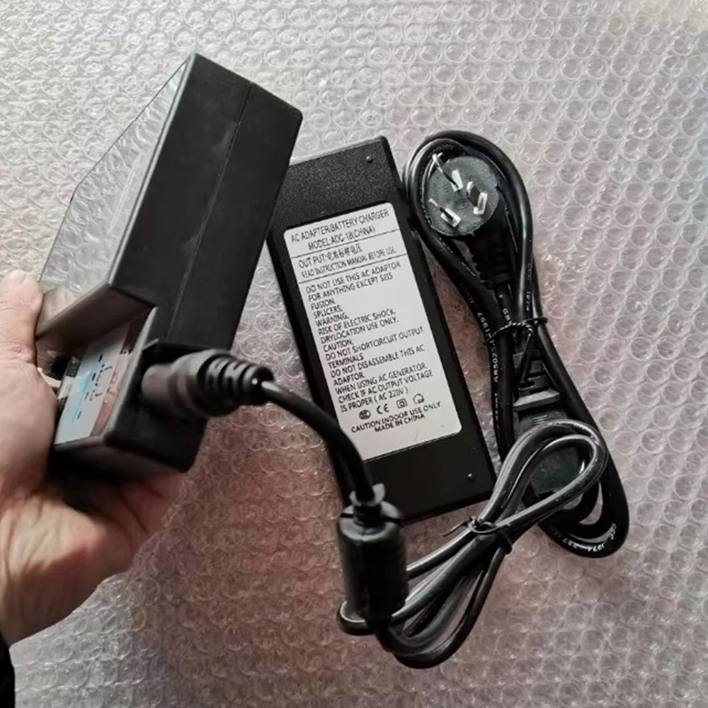 

Free Shipping BTR-09 Battery Charger ADC-18 For FSM 70S 70S+ 80S 61S 62S Optical Fiber Fusion Splicer AC Power Adapter