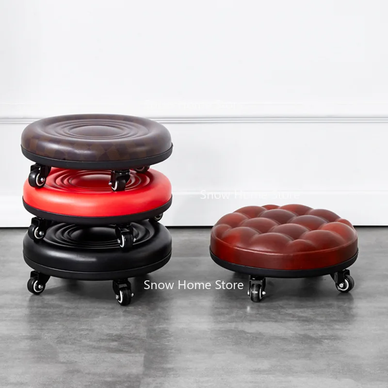 Caster-equipped low stool with universal wheels, round compact seating for home spaces, perfect as entryway shoe bench