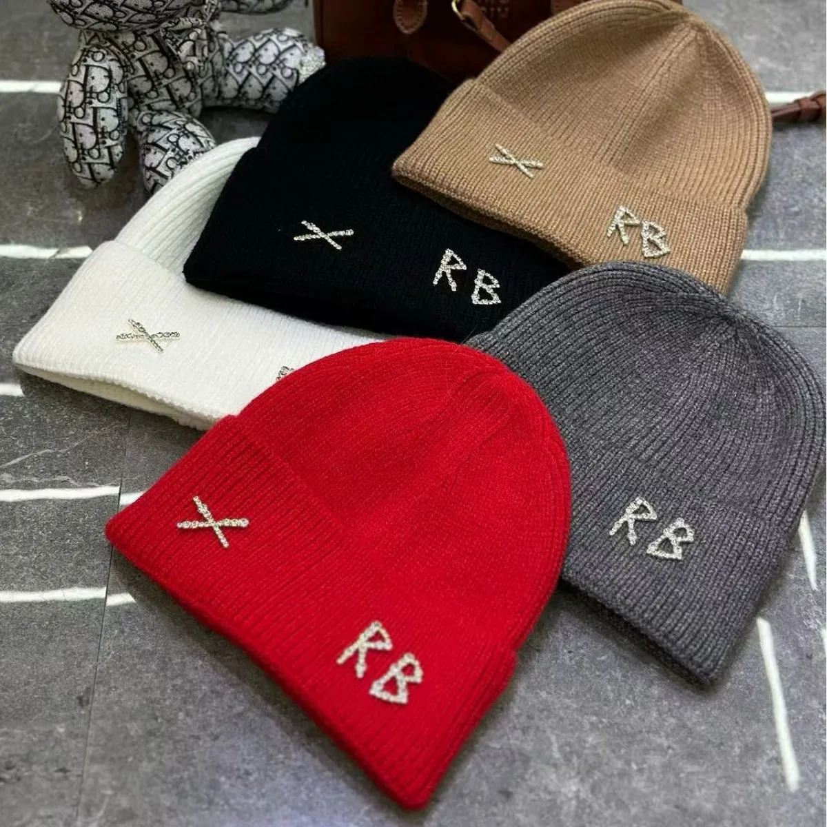 2025 new Korean version Xiaoxiangfeng bow wool hat big head circumference ear protectors knitted cold hat versatile knitted hat