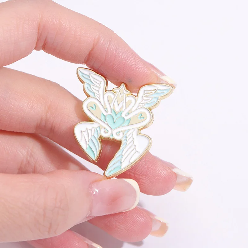 Fantasy Series Enamel Pin Blue and white winged angel eye brooch Hat Lapel Accessories Metal Badge Gift Jewelry Wholesale