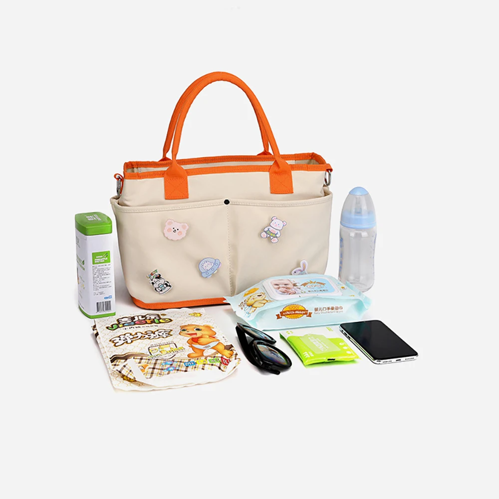 

Сумка для подгузников, милая, декоративная, в стиле пэчворк, оранжево-белая, с цветными блоками, с большим боковым карманом, легкая, из холщовой ткани, многофункциональная, для мамы