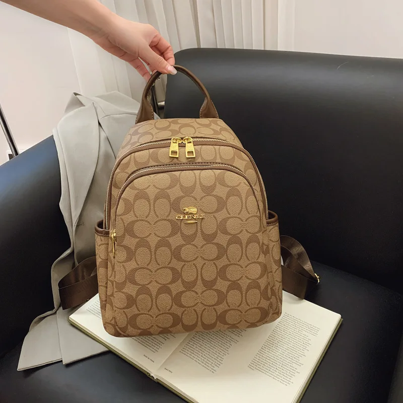 

Trendy Coated Backpack for Women | Spacious Vintage Travel Bag with Monogram Print | Waterproof Laptop Bag for Commuting & Trips