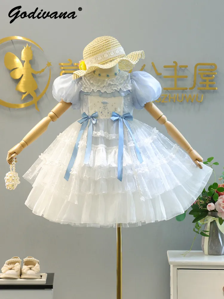 2026 New Summer Baby Girls High End Lolita Princess Dress Childrens Elegant Blue Bow Ruffle Lace Trim Puff Sleeve Mesh Cake Gown