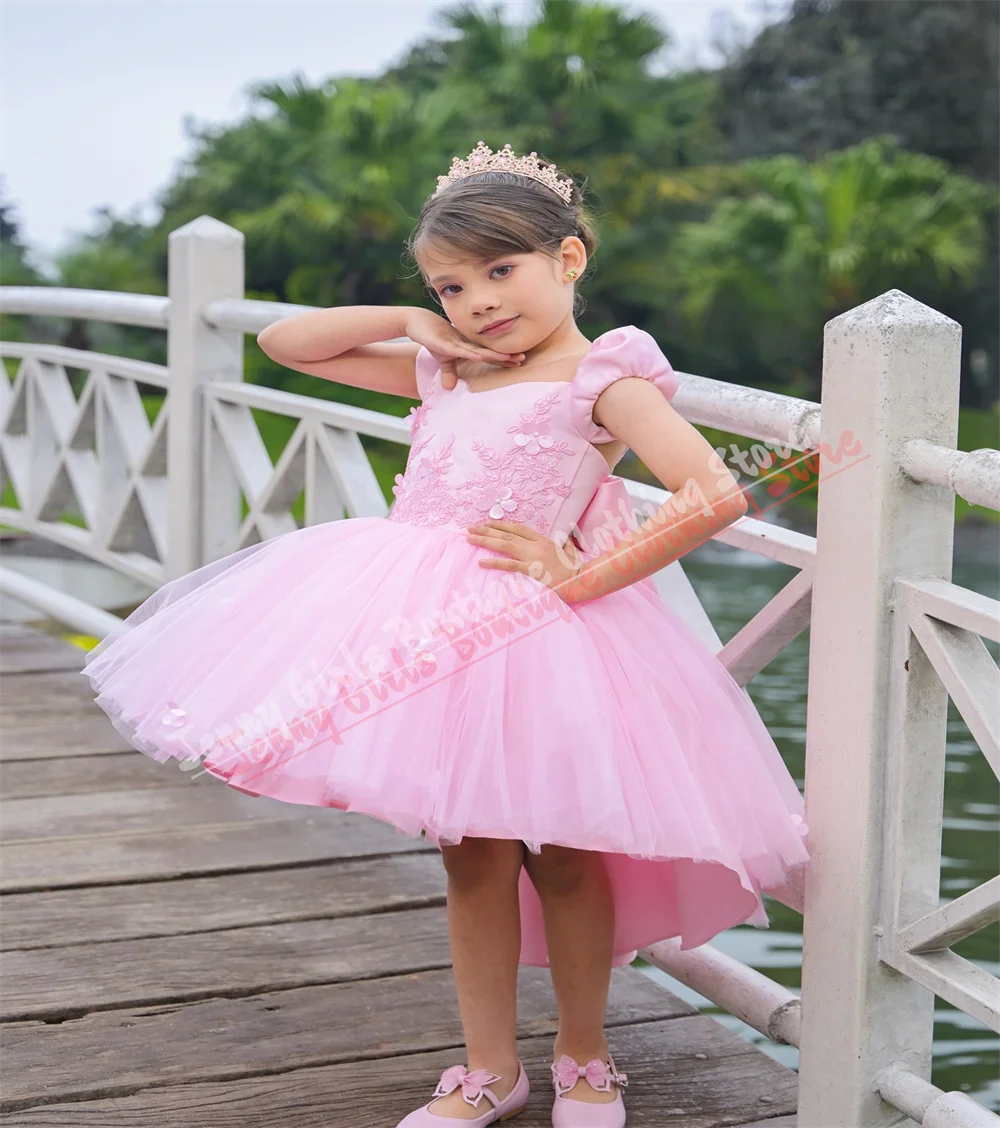 فستان فتاة الزهور الوردي الأنيق لحفلات الزفاف قبل قصير الظهر بفيونكة طويلة مفتوحة من الخلف للحفلات الراقصة الأميرة فستان التواصل الأول