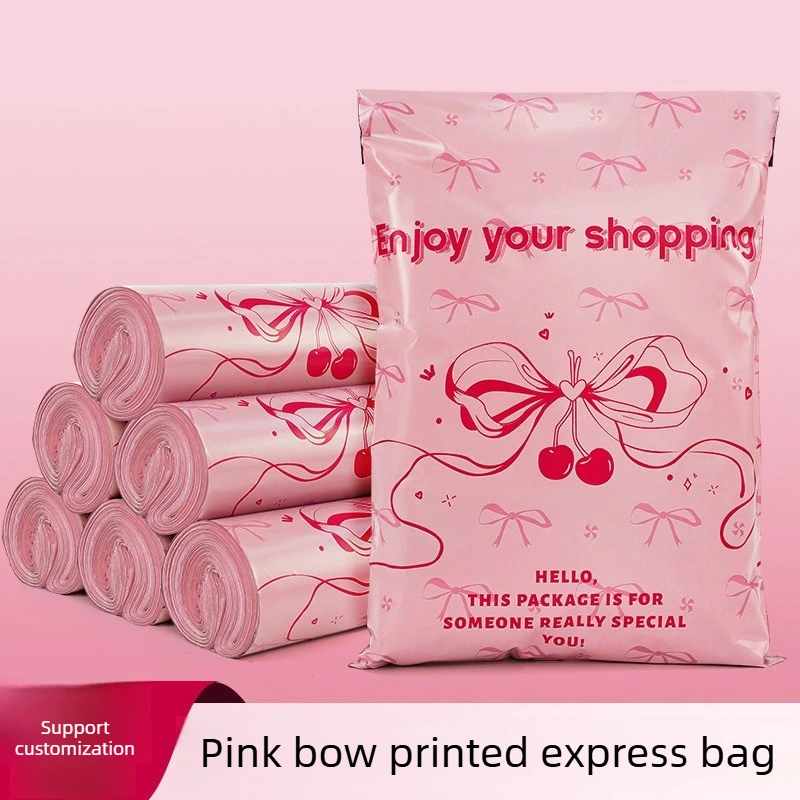 Supports dropshipping: pink, waterproof shipping bags featuring a bow pattern—an ideal choice for shipping clothing. Pack of 50.