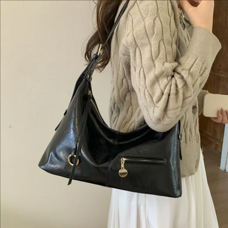 

Винтажная большая сумка 2025 года для женщин. Дизайнерская роскошная сумка. Модная стильная сумка через плечо через плечо. Модная и универсальная.