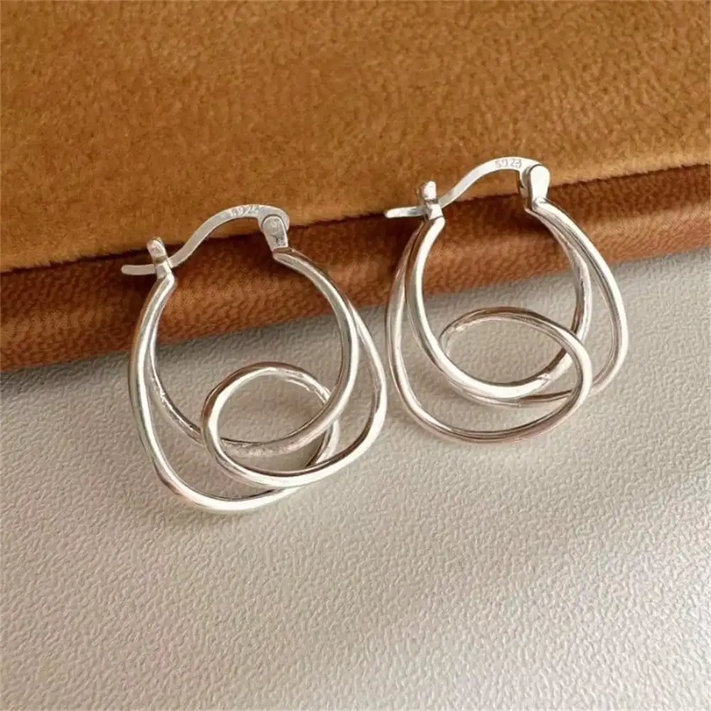 

Серебряные женские серьги с неровными изогнутыми линиями Cai'zhi