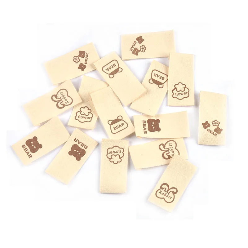 50pcs/lot 20x40mm Lovely Bear/Flower/Rabbit Printed Beige Label For DIY Decor Clothing Sewing Accessories Handmade Crafts c4146