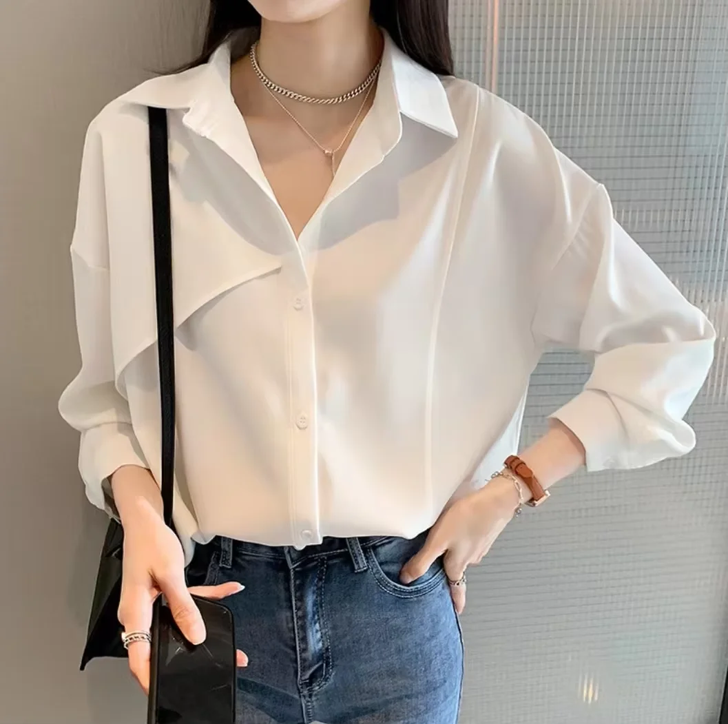 เสื้อเชิ้ตผู้หญิงสไตล์ฝรั่งเศส ผ้าชีฟองเรียบง่าย สไตล์ลำลอง ทรงหลวม ไม่สมมาตร ติดกระดุมแถวเดียว เหมาะสำหรับใส่ทำงานในออฟฟิศ  คอลเลคชั่นฤดูใบไม้ร่วง