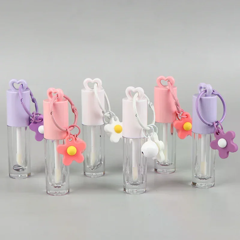 หลอดลิปกลอสทรงหัวใจสีชมพูขนาด 2.5 มล. พร้อมพวงกุญแจและแปรง หลอดลิปกลอสเปล่า ภาชนะใส่ลิปกลอส อุปกรณ์แต่งหน้า