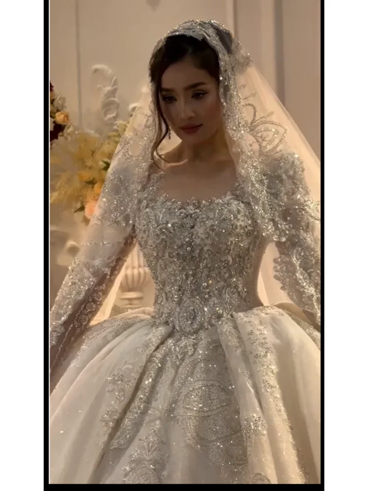 Customized luxury large skirt princess dress wedding dress lace pearl sequin decoration round neck long sleeved Vestido De Noiva