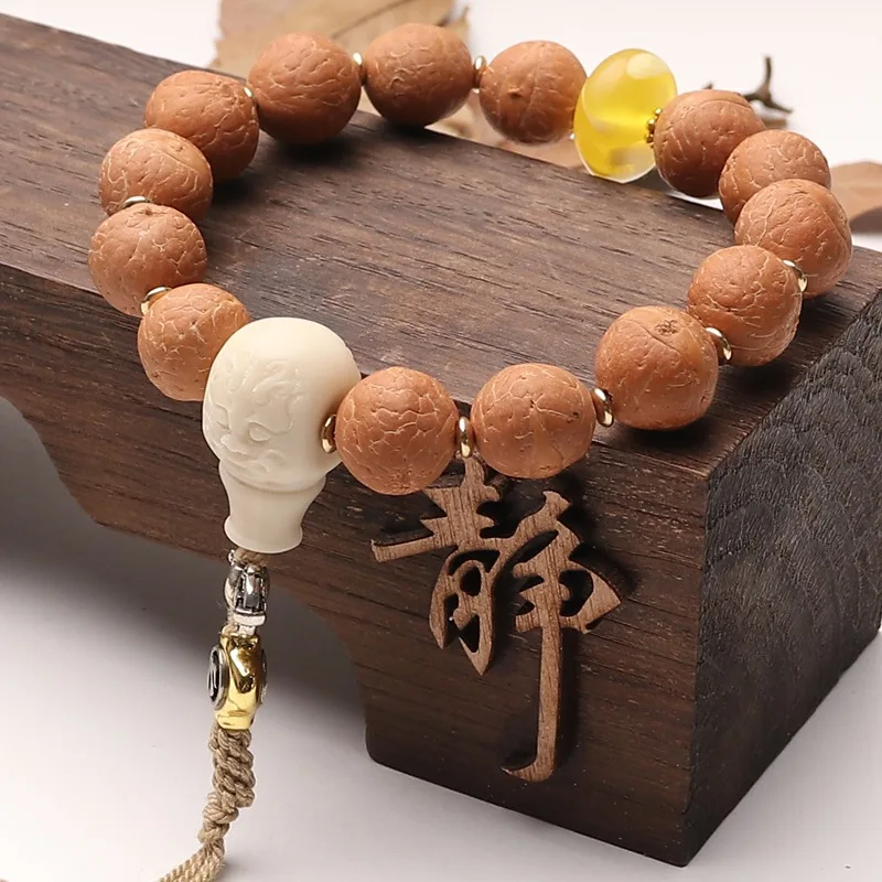 

Yellow Skin Eye Bracelet Buddha Seed Beads Bodhi Root Carved Three-Way Finished Handheld