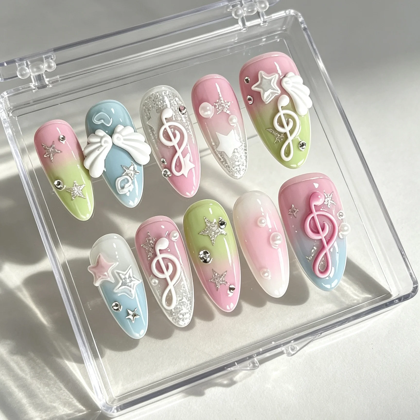 10 pièces de faux ongles en forme d'amande pressés à la main, magnifiques faux ongles, symboles colorés aux couleurs de bonbons, adaptés aux femmes.