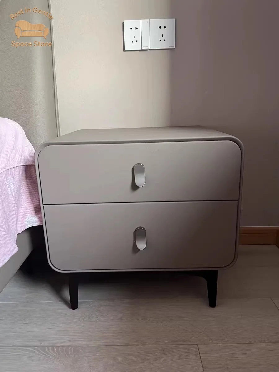 Light luxury solid wood bedside table creative simple modern narrow side round 2023 new small cream wind storage storage